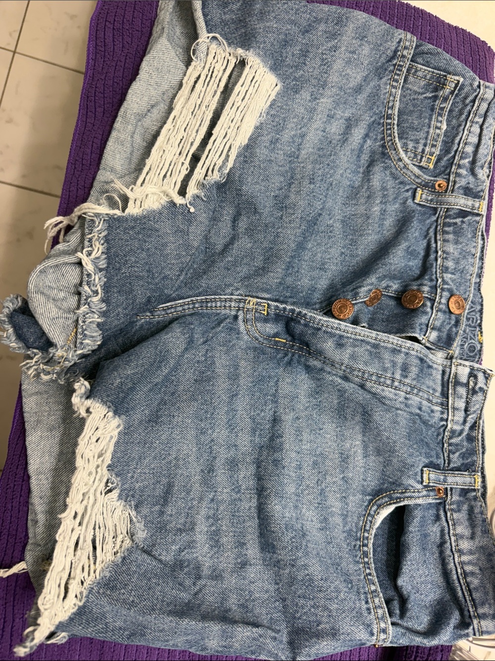 Women’s Distressed Light Blue Denim Jeans